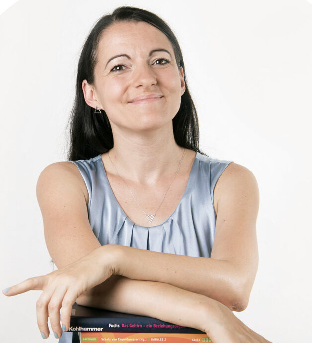 janett-mit-büchern-über-produktivität-1